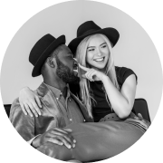 Fun young interracial couple laughing and playing together, showing joy and connection